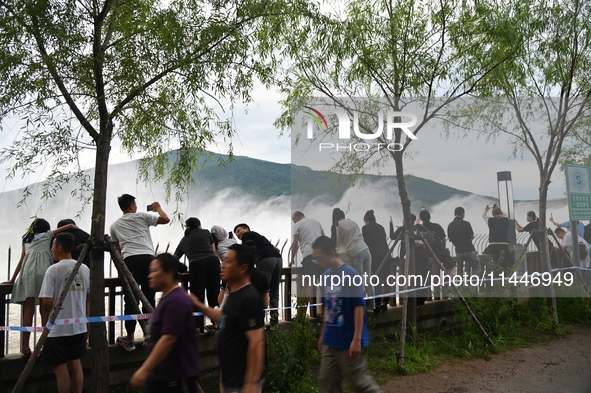 The Fengman Dam reservoir is opening the sluice to release floodwater in Jilin City, Jilin province, China, on July 31, 2024. 