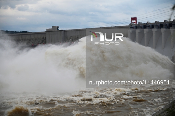 The Fengman Dam reservoir is opening the sluice to release floodwater in Jilin City, Jilin province, China, on July 31, 2024. 