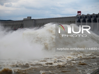 The Fengman Dam reservoir is opening the sluice to release floodwater in Jilin City, Jilin province, China, on July 31, 2024. (