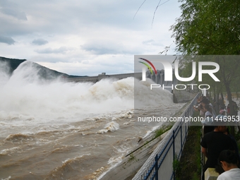 The Fengman Dam reservoir is opening the sluice to release floodwater in Jilin City, Jilin province, China, on July 31, 2024. (