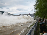 The Fengman Dam reservoir is opening the sluice to release floodwater in Jilin City, Jilin province, China, on July 31, 2024. (