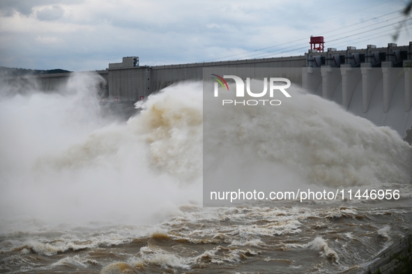 The Fengman Dam reservoir is opening the sluice to release floodwater in Jilin City, Jilin province, China, on July 31, 2024. 