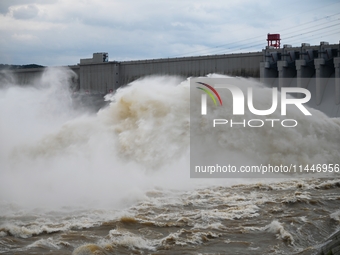 The Fengman Dam reservoir is opening the sluice to release floodwater in Jilin City, Jilin province, China, on July 31, 2024. (