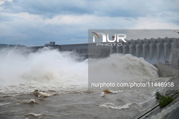 The Fengman Dam reservoir is opening the sluice to release floodwater in Jilin City, Jilin province, China, on July 31, 2024. 