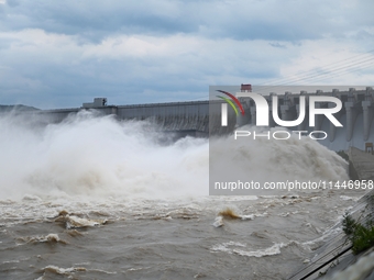 The Fengman Dam reservoir is opening the sluice to release floodwater in Jilin City, Jilin province, China, on July 31, 2024. (