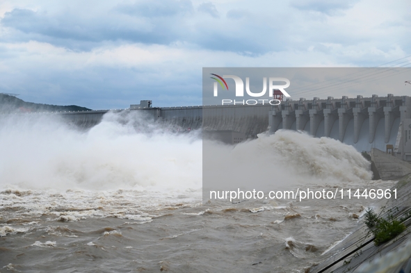 The Fengman Dam reservoir is opening the sluice to release floodwater in Jilin City, Jilin province, China, on July 31, 2024. 