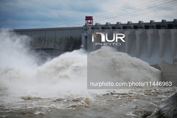 The Fengman Dam reservoir is opening the sluice to release floodwater in Jilin City, Jilin province, China, on July 31, 2024. 