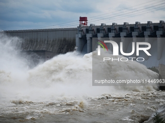 The Fengman Dam reservoir is opening the sluice to release floodwater in Jilin City, Jilin province, China, on July 31, 2024. (