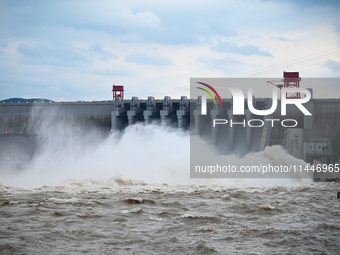 The Fengman Dam reservoir is opening the sluice to release floodwater in Jilin City, Jilin province, China, on July 31, 2024. (