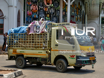 A truck is being filled with goods in Thiruvananthapuram (Trivandrum), Kerala, India, on April 13, 2024. (