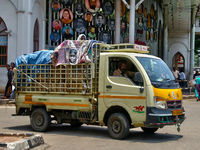 A truck is being filled with goods in Thiruvananthapuram (Trivandrum), Kerala, India, on April 13, 2024. (