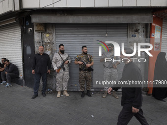 The Islamic Revolutionary Guard Corps (IRGC) armed special forces are monitoring an area during a funeral ceremony for Hamas leader Ismail H...