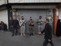 The Islamic Revolutionary Guard Corps (IRGC) armed special forces are monitoring an area during a funeral ceremony for Hamas leader Ismail H...