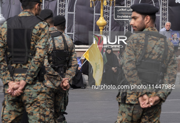 Iranian special police forces are monitoring an area during a funeral ceremony for Hamas leader Ismail Haniyeh and his bodyguard Abu Shaaban...