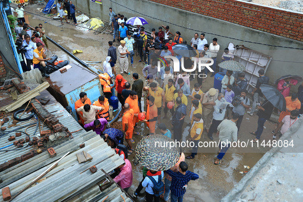 Police and SDRF personnel are conducting a rescue operation after three people drowned in rainwater that entered the basement of their house...