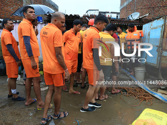 Police and SDRF personnel are conducting a rescue operation after three people drowned in rainwater that entered the basement of their house...