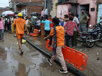 Police and SDRF personnel are conducting a rescue operation after three people drowned in rainwater that entered the basement of their house...