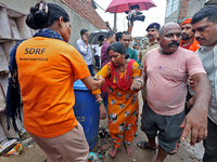 Family members are mourning after three people drowned in rainwater that entered the basement of their house due to heavy rainfall in the VK...