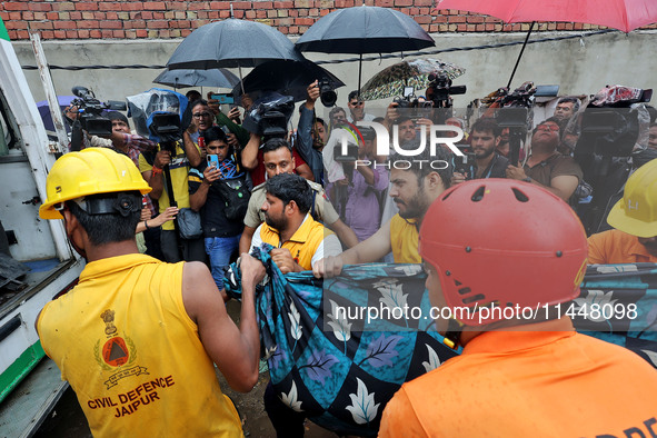 Police and SDRF personnel are conducting a rescue operation after three people drowned in rainwater that entered the basement of their house...