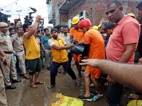 Police and SDRF personnel are conducting a rescue operation after three people drowned in rainwater that entered the basement of their house...