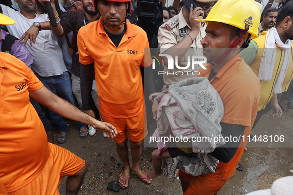 Police and SDRF personnel are conducting a rescue operation after three people drowned in rainwater that entered the basement of their house...