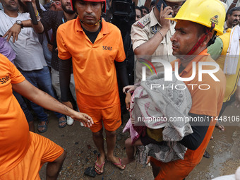 Police and SDRF personnel are conducting a rescue operation after three people drowned in rainwater that entered the basement of their house...