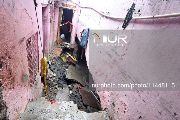 An inside view of a house after three people are drowning in rainwater that is entering the basement due to heavy rainfall in the VKI area i...