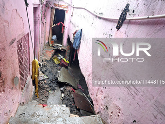 An inside view of a house after three people are drowning in rainwater that is entering the basement due to heavy rainfall in the VKI area i...