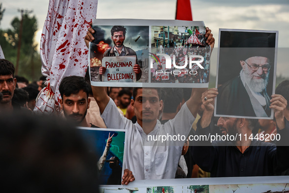 Shia devotees are condemning the killing in Parachinar as they hold Yahya Sinwar's portraits during the 25th Muharram procession in Baramull...