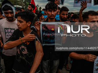 Shia devotees are condemning the killing in Parachinar as they hold Yahya Sinwar's portraits during the 25th Muharram procession in Baramull...