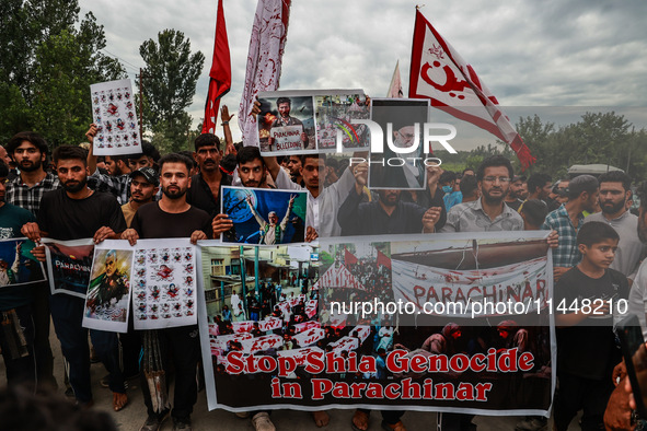 Shia devotees are condemning the killing in Parachinar as they hold Yahya Sinwar's portraits during the 25th Muharram procession in Baramull...