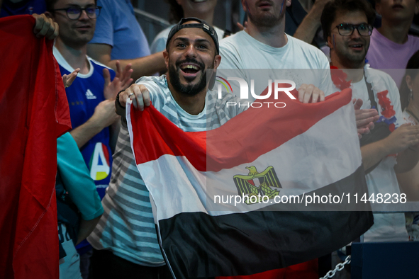 A fan of the Egypt team is cheering during the men's Handball Preliminary Round - Group B match between France and Egypt in Paris, France, o...