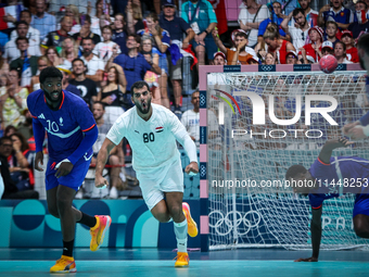 Ahmed ADEL of the Egypt Team is celebrating during the men's Handball Preliminary Round - Group B match between France and Egypt in Paris, F...