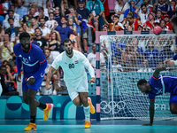 Ahmed ADEL of the Egypt Team is celebrating during the men's Handball Preliminary Round - Group B match between France and Egypt in Paris, F...