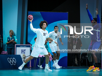 Ali ZEIN of the Egypt Team is playing during the men's Handball Preliminary Round - Group B match between France and Egypt in Paris, France,...