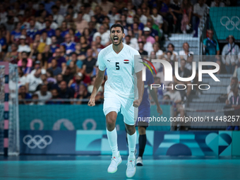 Yahia OMAR of the Egypt Team is celebrating during the men's Handball Preliminary Round - Group B match between France and Egypt in Paris, F...