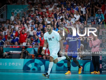 Yehia ELDERAA of the Egypt Team is celebrating during the men's Handball Preliminary Round - Group B match between France and Egypt in Paris...