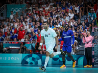 Yehia ELDERAA of the Egypt Team is celebrating during the men's Handball Preliminary Round - Group B match between France and Egypt in Paris...