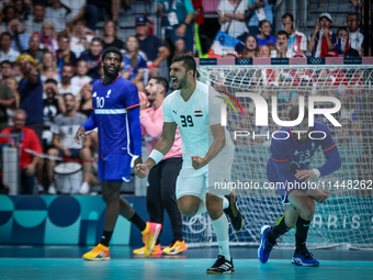 Yehia ELDERAA of the Egypt Team is celebrating during the men's Handball Preliminary Round - Group B match between France and Egypt in Paris...