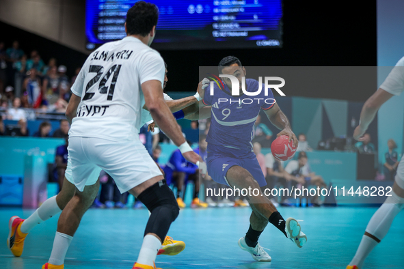 Melvyn Richardson of the France Team is playing during the men's Handball Preliminary Round - Group B match between France and Egypt in Pari...