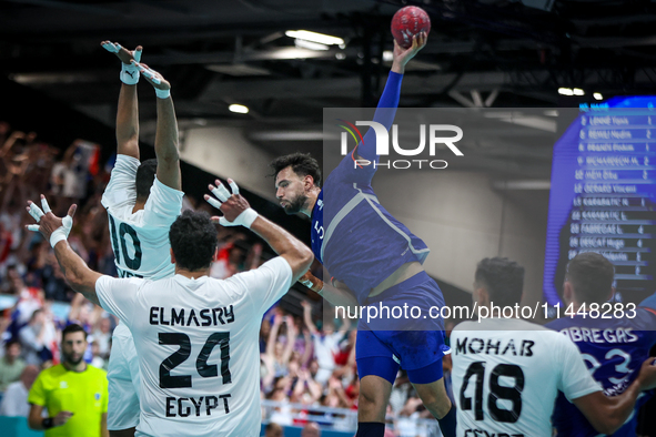 Nedim REMILI of the France Team is shooting the ball during the Men's Preliminary Round Group B match between France and Egypt in Paris, Fra...