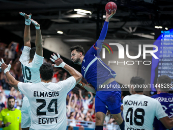 Nedim REMILI of the France Team is shooting the ball during the Men's Preliminary Round Group B match between France and Egypt in Paris, Fra...