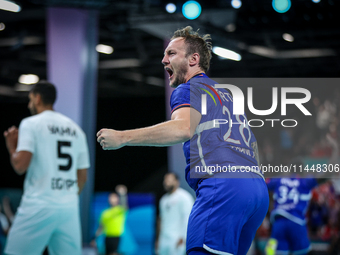 Valentin PORTE of the France Team is celebrating during the men's Handball Preliminary Round - Group B match between France and Egypt in Par...