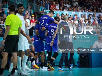 Yanis Lenne of the France Team is getting injured during the Men's Preliminary Round Group B match between France and Egypt in Paris, France...