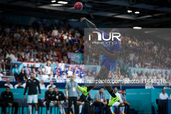 Dylan NAHI of France Team is shooting the ball during the Men's Preliminary Round Group B match between France and Egypt on day five of the...