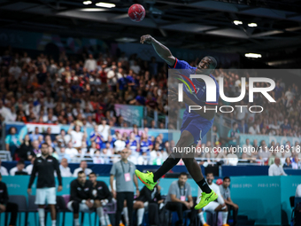 Dylan NAHI of France Team is shooting the ball during the Men's Preliminary Round Group B match between France and Egypt on day five of the...