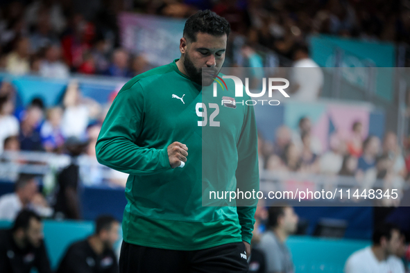 Mohamed ALY, the goalkeeper of the Egypt team, is celebrating during the men's Handball Preliminary Round - Group B match between France and...