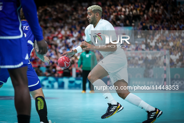 Ahmed HESHAM of the Egypt Team is playing during the men's Handball Preliminary Round - Group B match between France and Egypt on Day 5 of t...