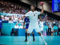 Yahia OMAR of the Egypt team is shooting the ball during the Men's Preliminary Round Group B match between France and Egypt on day five of t...