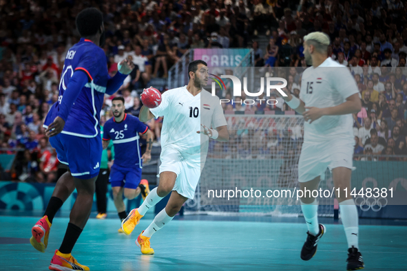 Abdelrahman ABDOU of the Egypt Team is playing during the men's Handball Preliminary Round - Group B match between France and Egypt in Paris...